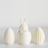 Handmade non-chocolate Easter gift set featuring a sculptural soy wax bunny and ribbed egg candle by Krisha Essence Perth.