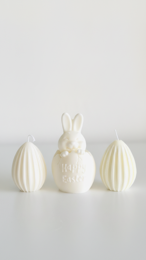 Handmade non-chocolate Easter gift set featuring a sculptural soy wax bunny and ribbed egg candle by Krisha Essence Perth.