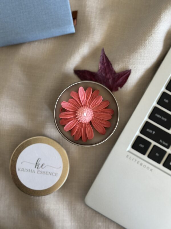 Detailed shot of handcrafted daisy wax toppings on a luxury floral soy candle gift.