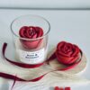Rose & Romance Candle in glass jar with wax rose top and rose vanilla fragrance