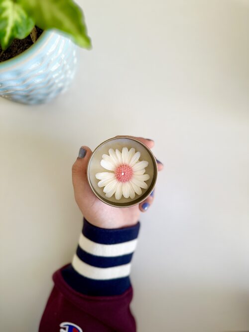 Daisy Bloom Candle in tin jar with rose and vanilla fragrance