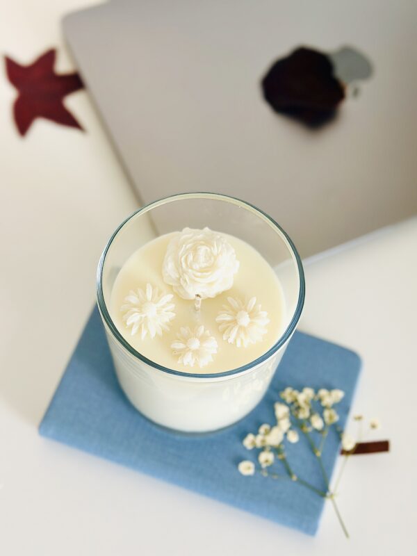 Close-up of a non-toxic floral soy candle from Krisha Essence showing intricate wax flower details and clean-burning soy wax.