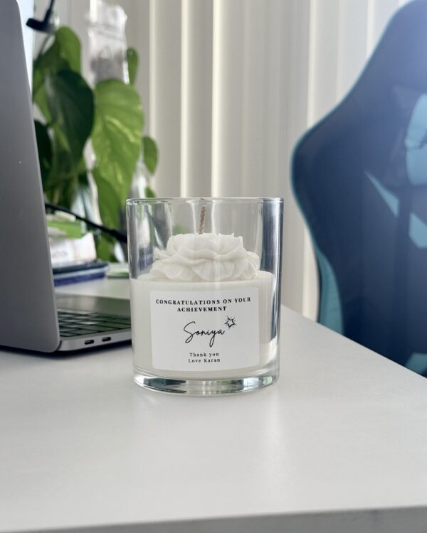 Personalised peony candle used as a luxury wedding favour or anniversary gift with custom botanical scent