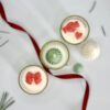 Festive 3-pack mini soy candles in gift box with decorative bows and pine tree toppers