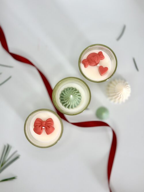 Festive 3-pack mini soy candles in gift box with decorative bows and pine tree toppers