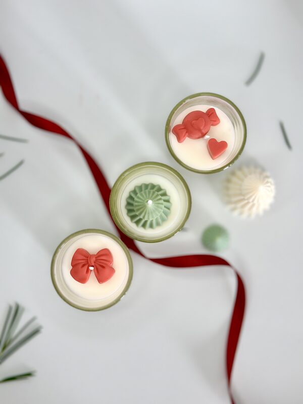 Festive 3-pack mini soy candles in gift box with decorative bows and pine tree toppers
