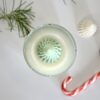 Christmas candle by Krisha Essence featuring Nordic pine and vanilla scent