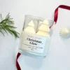 Hand poured Christmas candle Perth, Christmas Glow soy candle with tree-shaped wax toppers and festive ribbon