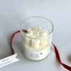 Festive soy Christmas candle Australia featuring detailed white snowflake top.