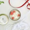 Handcrafted Valentine’s Day candle Heartlight in tin jar with aromatic rose and amber