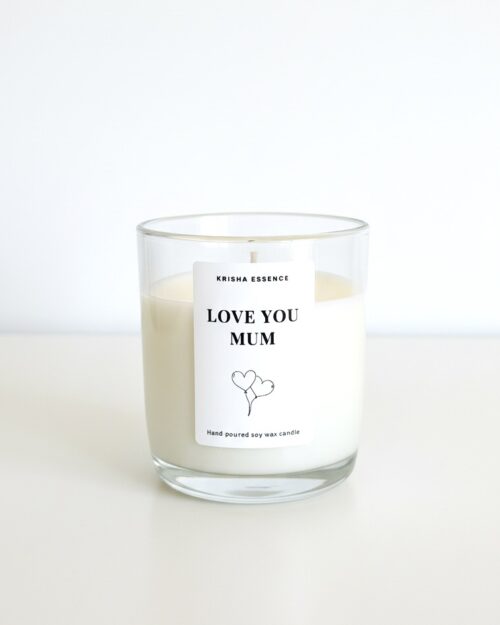A minimalist 'Love You Mum' glass jar candle styled on a table representing the ultimate relaxation gift for her