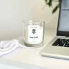 Handmade rose candle gift Australia option by Krisha Essence, showing the Rose Petals soy wax jar candle next to its custom white cotton drawstring gift pouch.