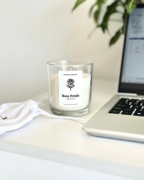 Handmade rose candle gift Australia option by Krisha Essence, showing the Rose Petals soy wax jar candle next to its custom white cotton drawstring gift pouch.